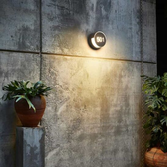 LWA384 illuminated outdoor number light fitted on a wall