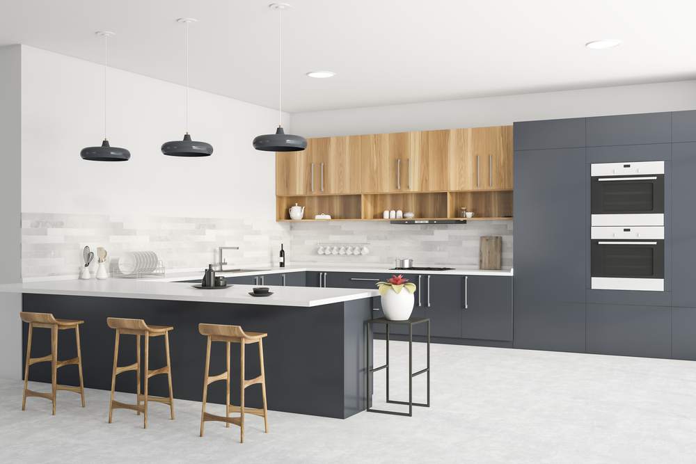 breakfast bar with 3 pendant lights above it