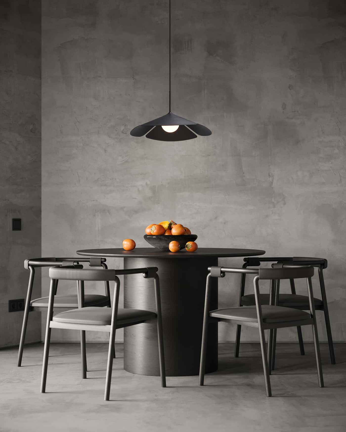 single pendant light hung over a dining table