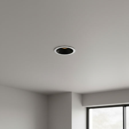 black recessed downlight installed in a modern home living room 
