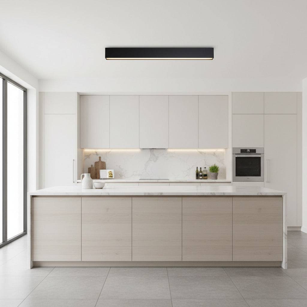 black linear surface downlight mounted on the ceiling in a modern kitchen
