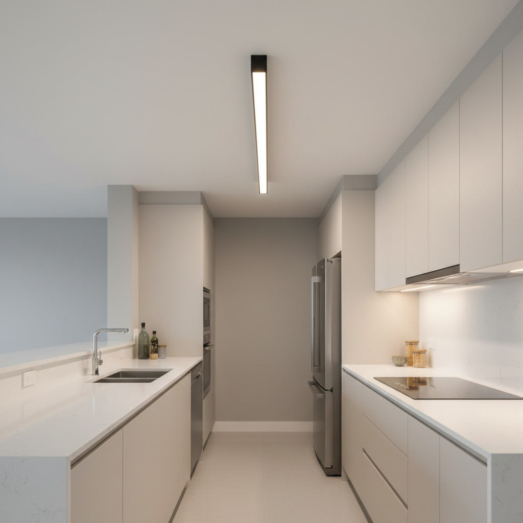 black surface mounted linear light shown in a galley kitchen 