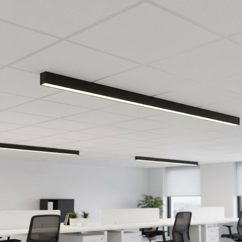 black surface mounted linear light fitted in a modern office 