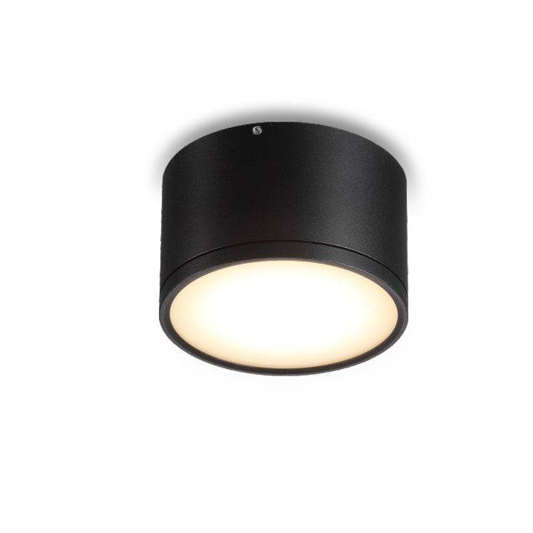 black round LED surface mount light on a white background