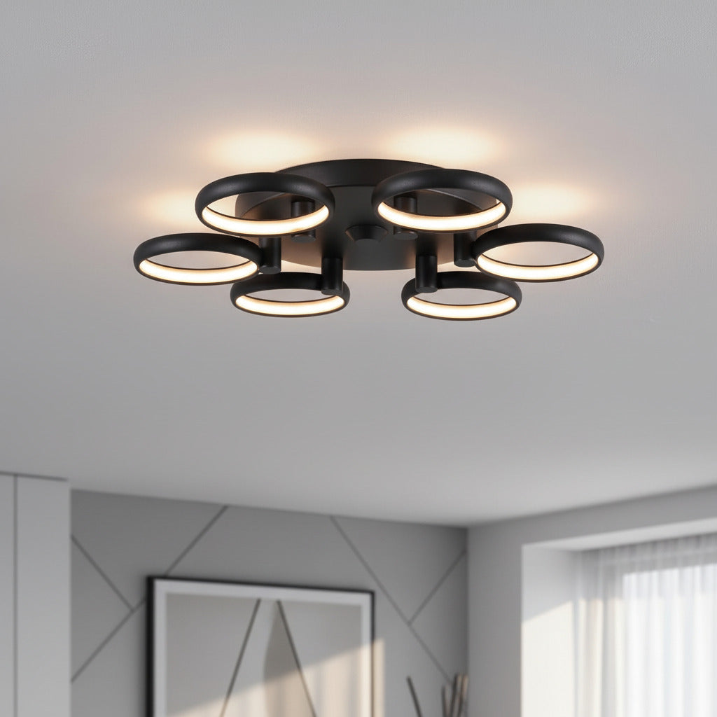 black large flush ceiling light installed in the large living room of a home 
