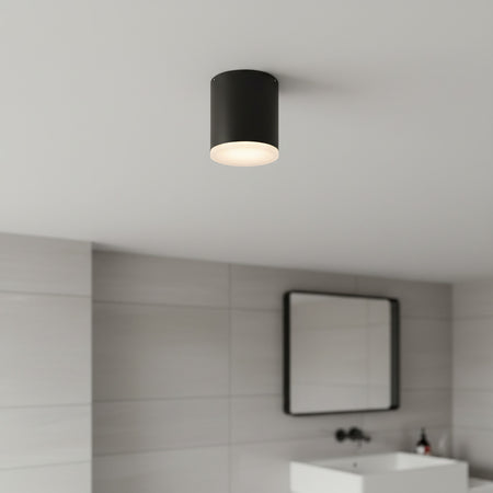 black bathroom ceiling light fixture fitted in a modern bathroom 