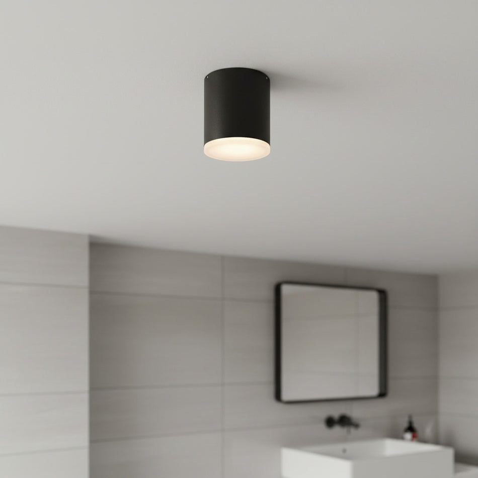 black bathroom ceiling light fixture fitted in a modern bathroom 