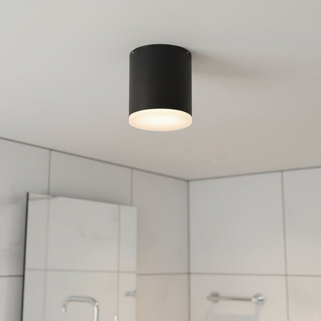 black bathroom ceiling light fixture mounted on the ceiling of a modern bathroom 