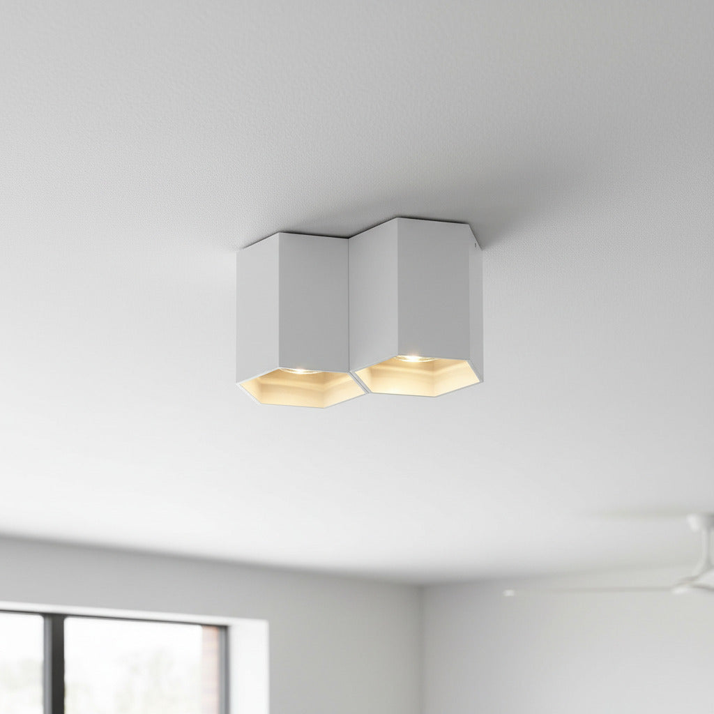 white contemporary ceiling light mounted on a living room ceiling 