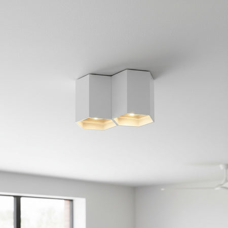 white contemporary ceiling light mounted on a living room ceiling 