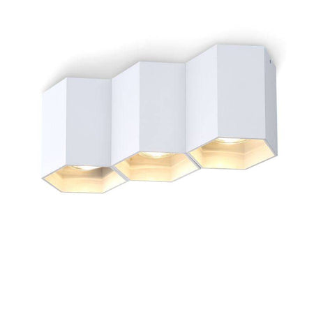 white flush mount ceiling light fixture on a white background