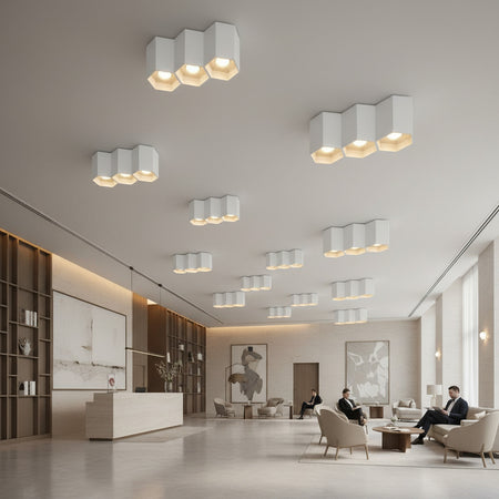 white flush mount ceiling light fixture in a hotel reception area