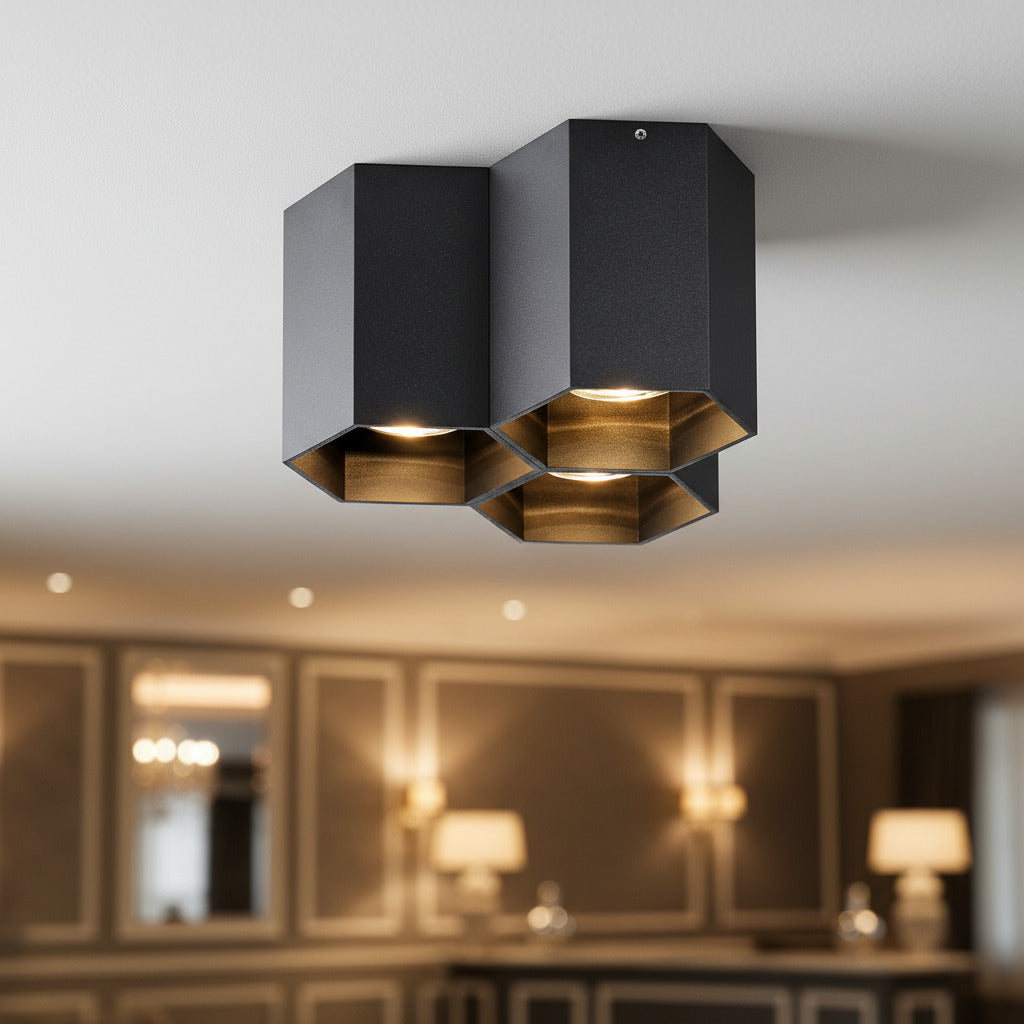 Black surface mounted ceiling spotlights in a modern hotel reception 