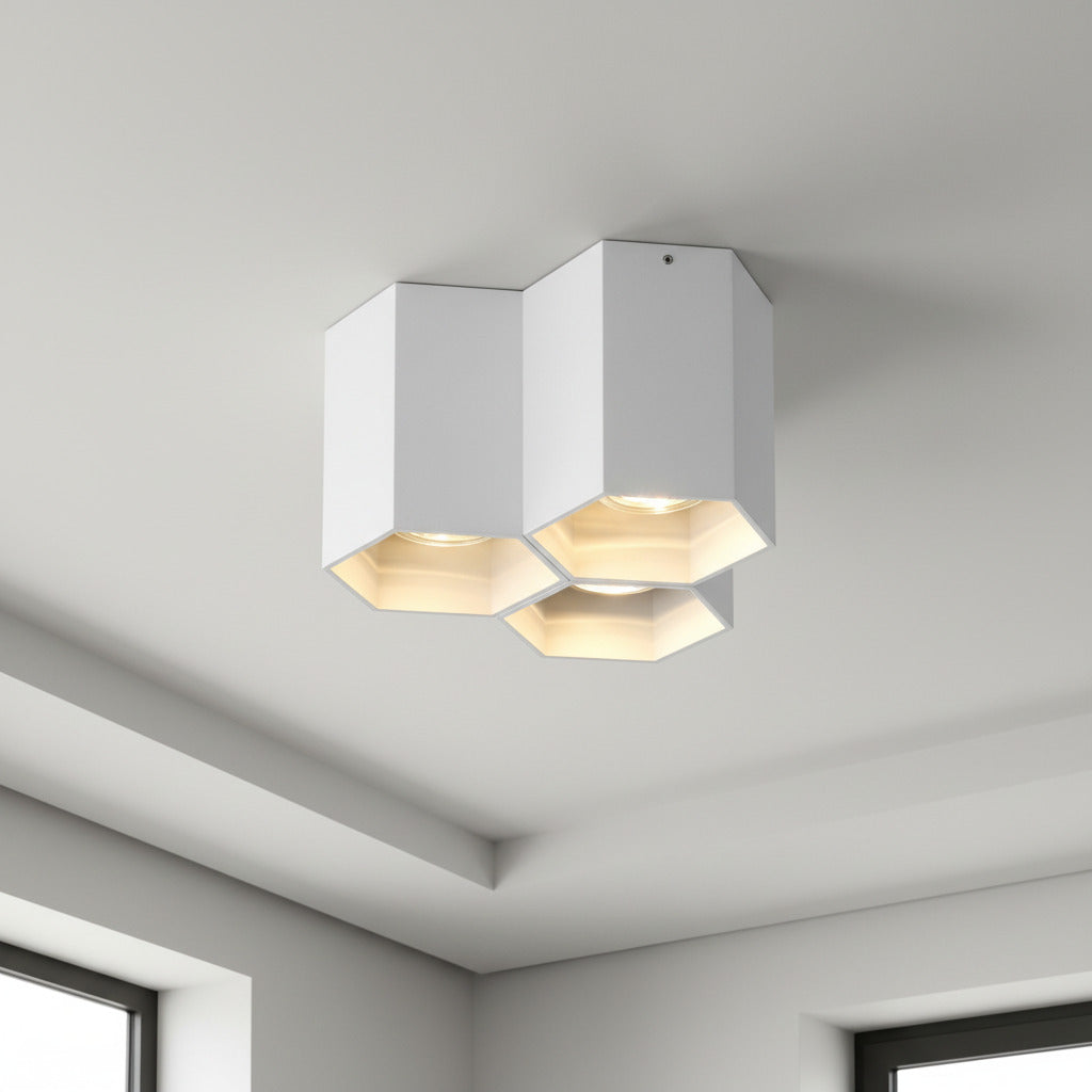 white modern flush ceiling light mounted in a modern home 