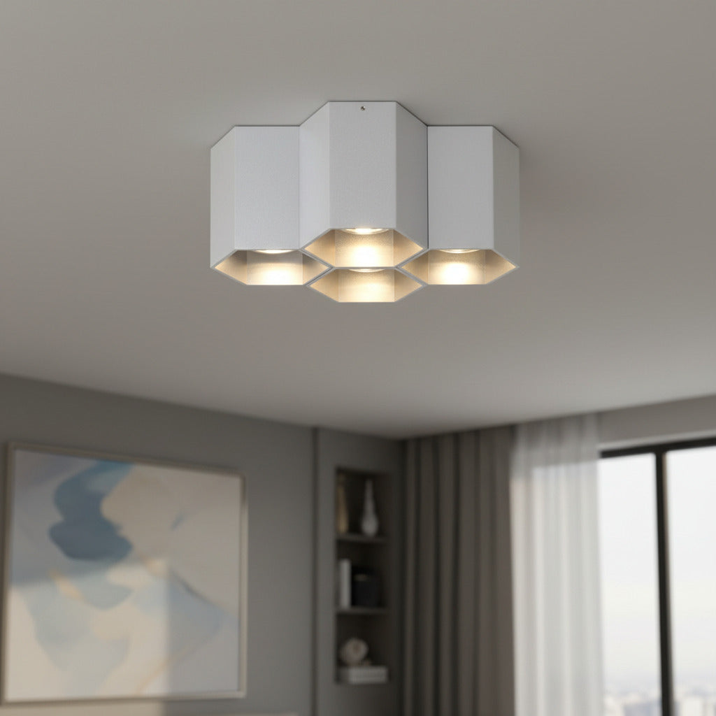 silver modern flush mount ceiling light install in the living room of a modern home 