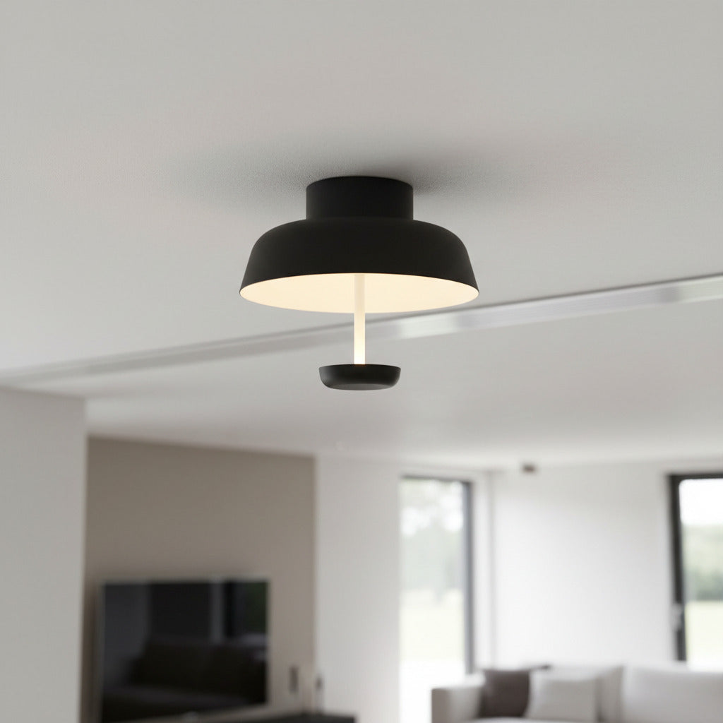 black semi flush ceiling light mounted in a modern living area 