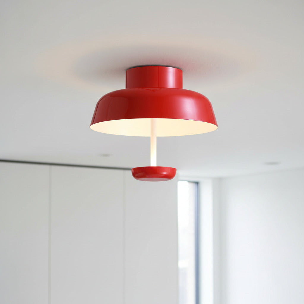 red modern semi flush ceiling light mounted in a modern home 
