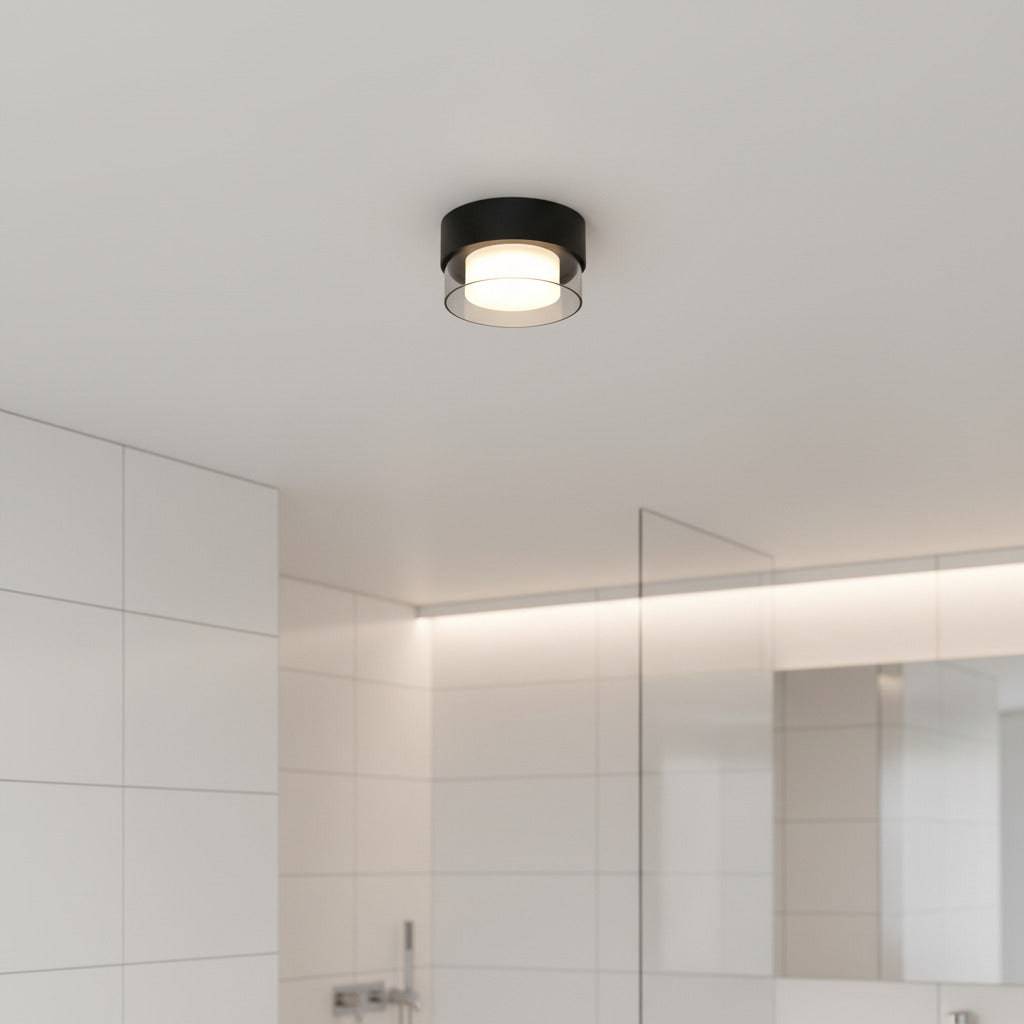 black round LED bathroom ceiling light fitted in a modern bathroom