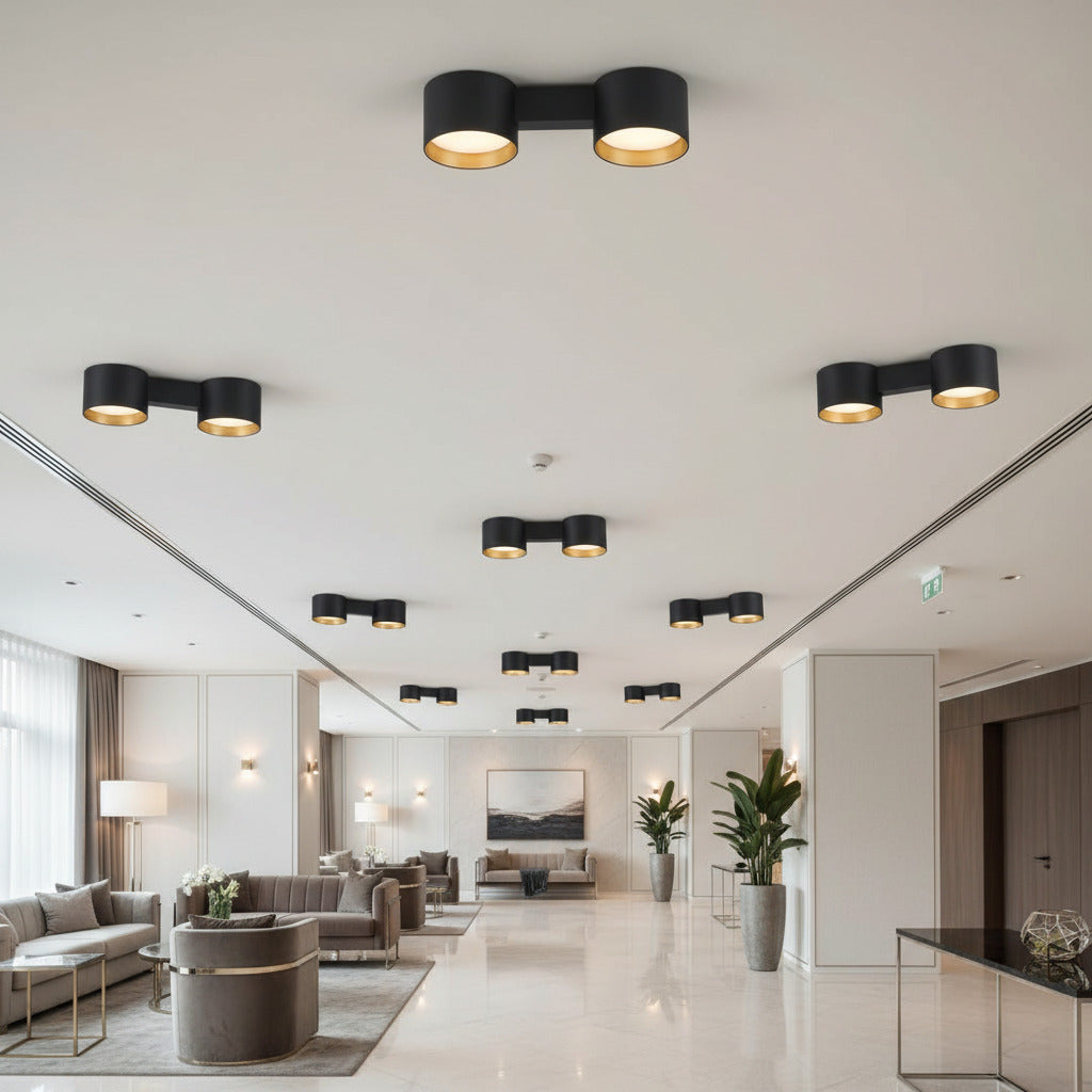 black flush fitting ceiling light mounted in a hotel reception area