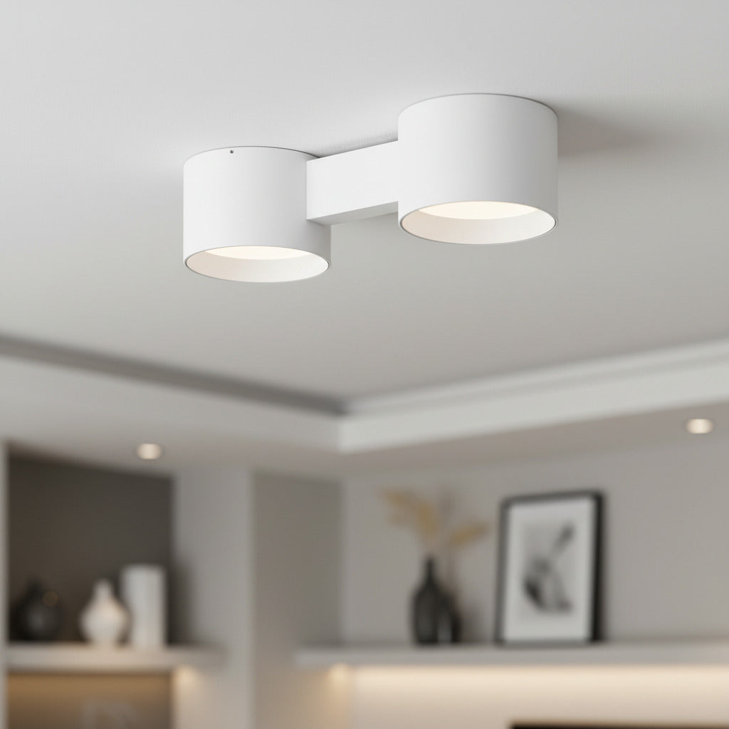 white flush ceiling light fixture mounted on the ceiling of a modern home