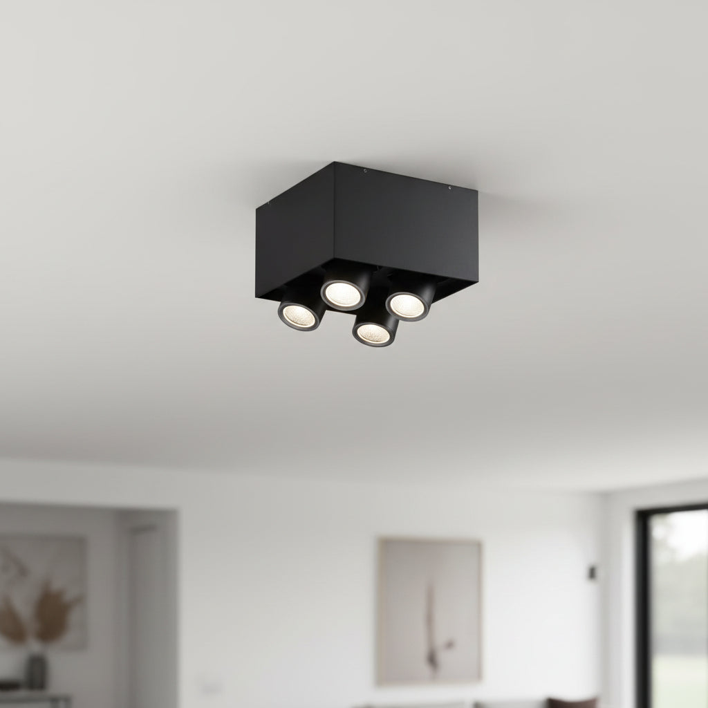 surface mounted black downlight installed on the ceiling in a modern house