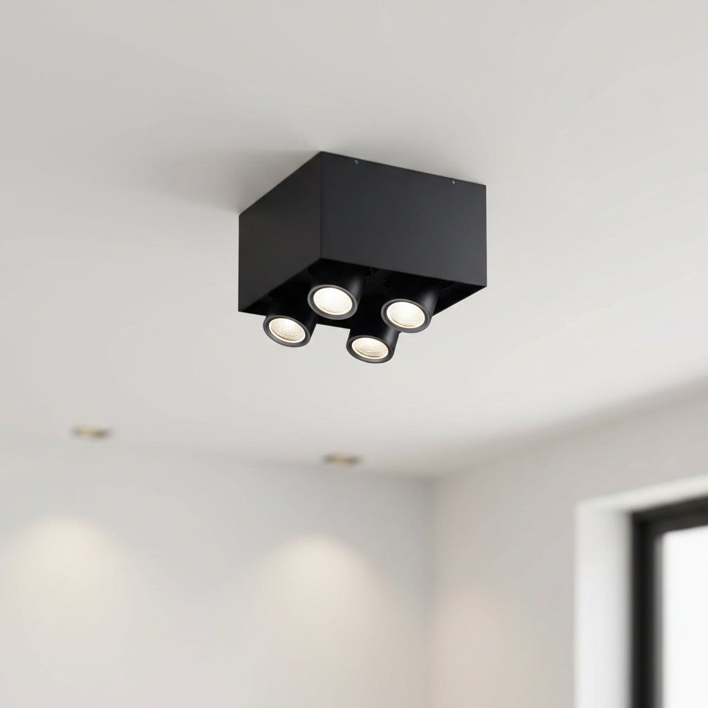 surface mounted black downlight installed on the ceiling in a modern house