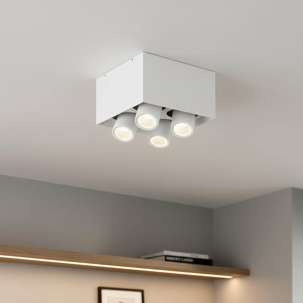 white surface mounted ceiling adustable spotlight fitted on the ceiling in a modern house