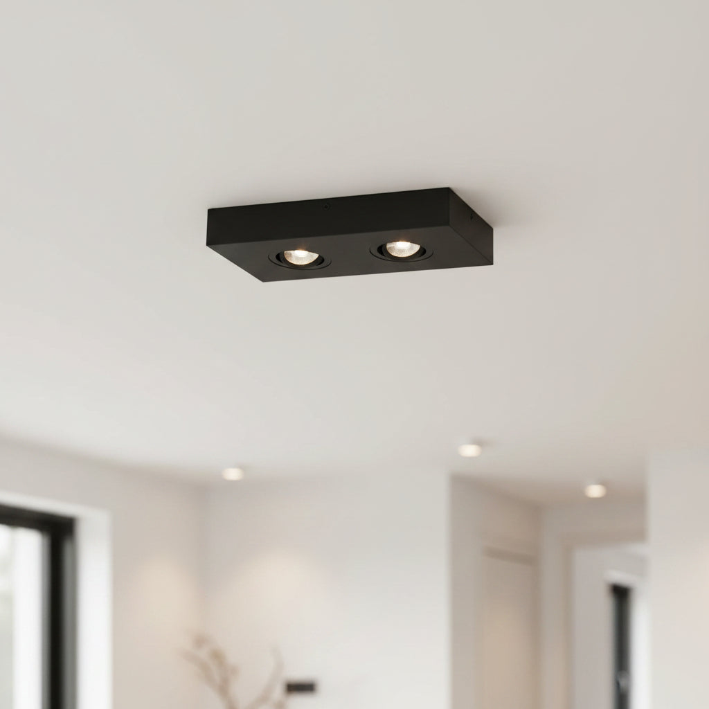 black slim surface mount LED downlight installed in a modern home 