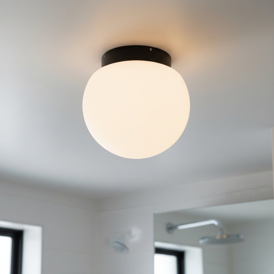 modern bathroom ceiling light mounted in a modern home bathroom 