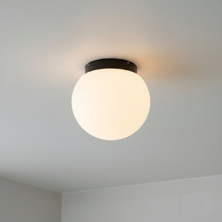 modern bathroom ceiling light fitted on the ceiling in a house bathroom 