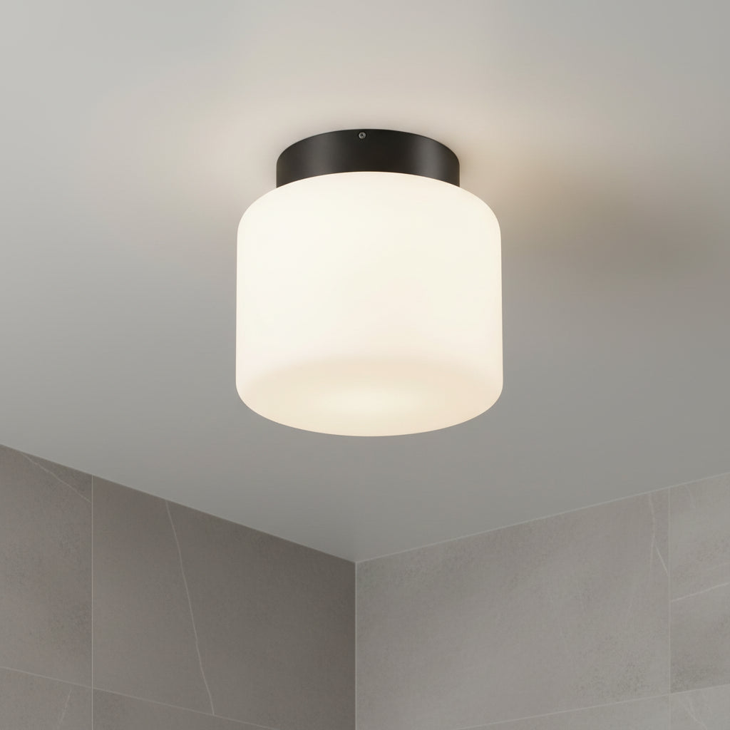 waterproof bathroom ceiling light installed in a grey bathroom 