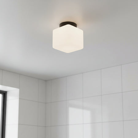 IP65 bathroom ceiling light mounted on a grey ceiling in a bathroom 