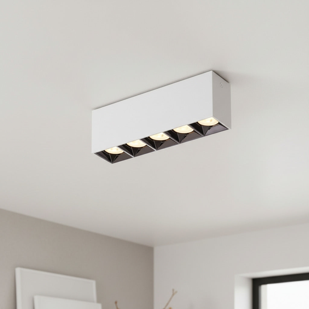 white modern flush ceiling light mounted on the ceiling in a moder kitchen