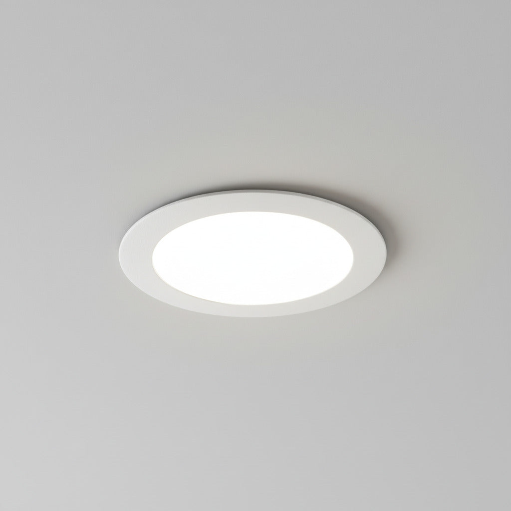 white slimline ceiling downlighter installed in a grey ceiling 