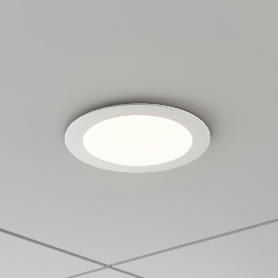 white slimline ceiling downlighter fitted in a suspended ceiling