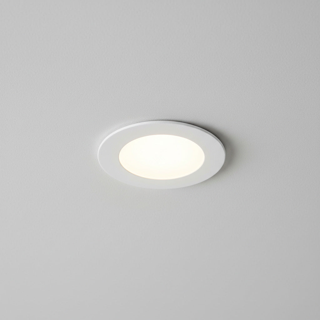 white ultra slim downlight installed on a grey ceiling