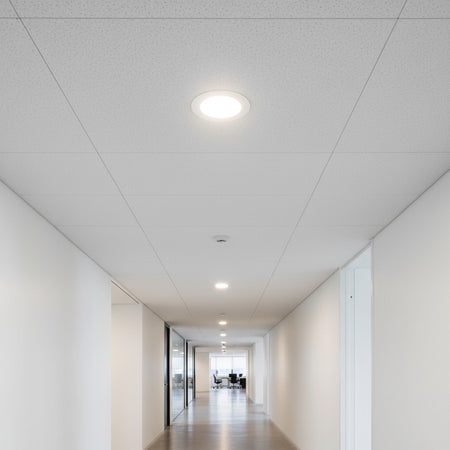 white ultra slim downlight installed in an office corridor