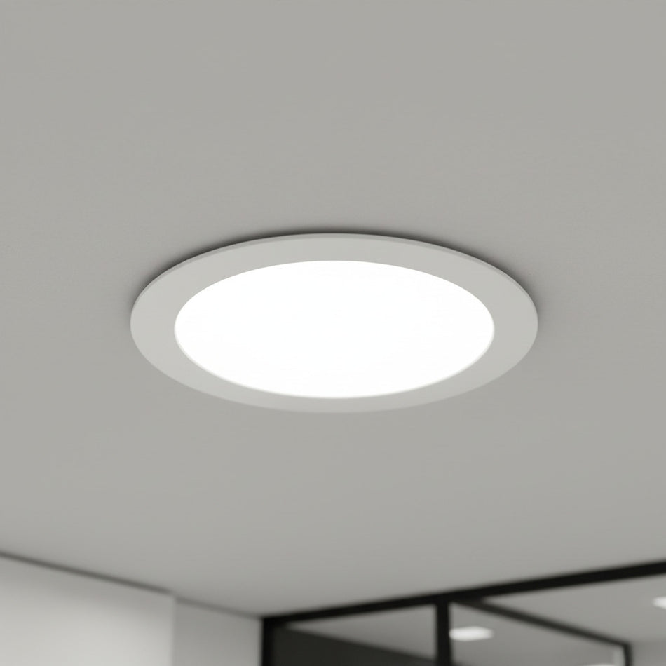 white slim downlight installed into a hotel ceiling 
