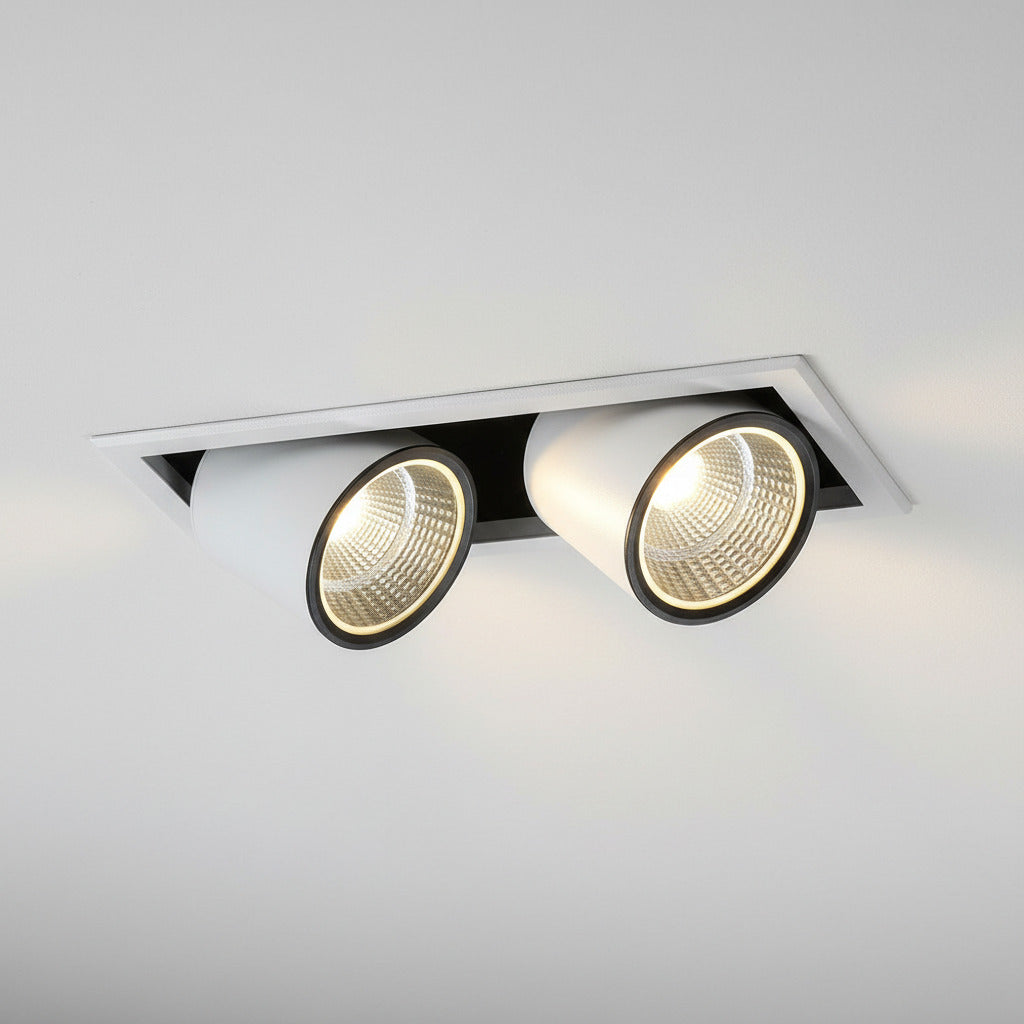 commercial display downlight installed on a grey ceiling 