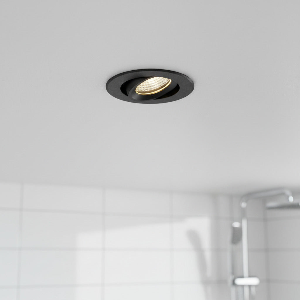 black bathroom downlight fitted in a modern bathroom ceiling 