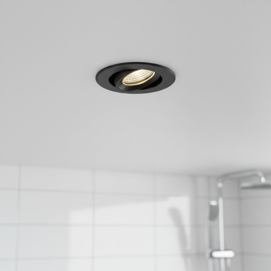 black bathroom downlight fitted in a modern bathroom ceiling 