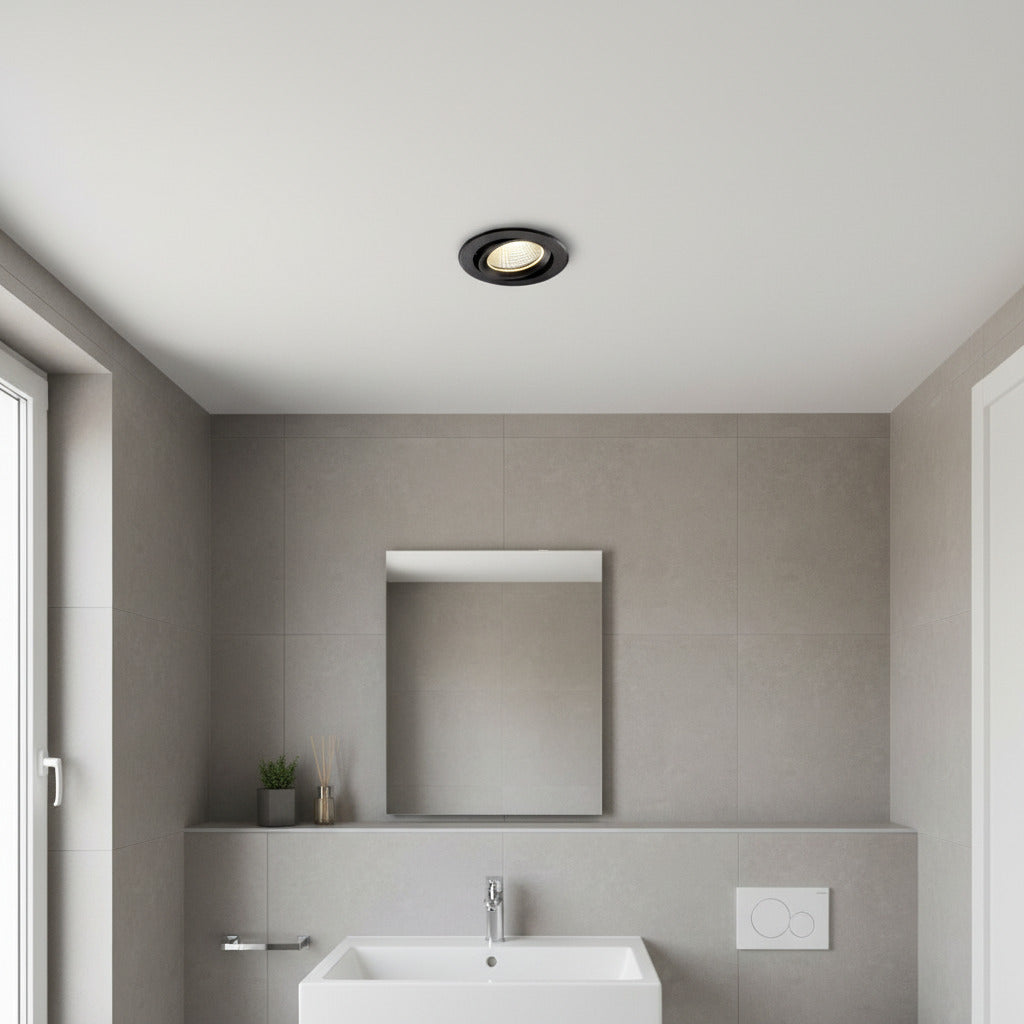 black recessed bathroom spotlight installed in a small modern bathroom 
