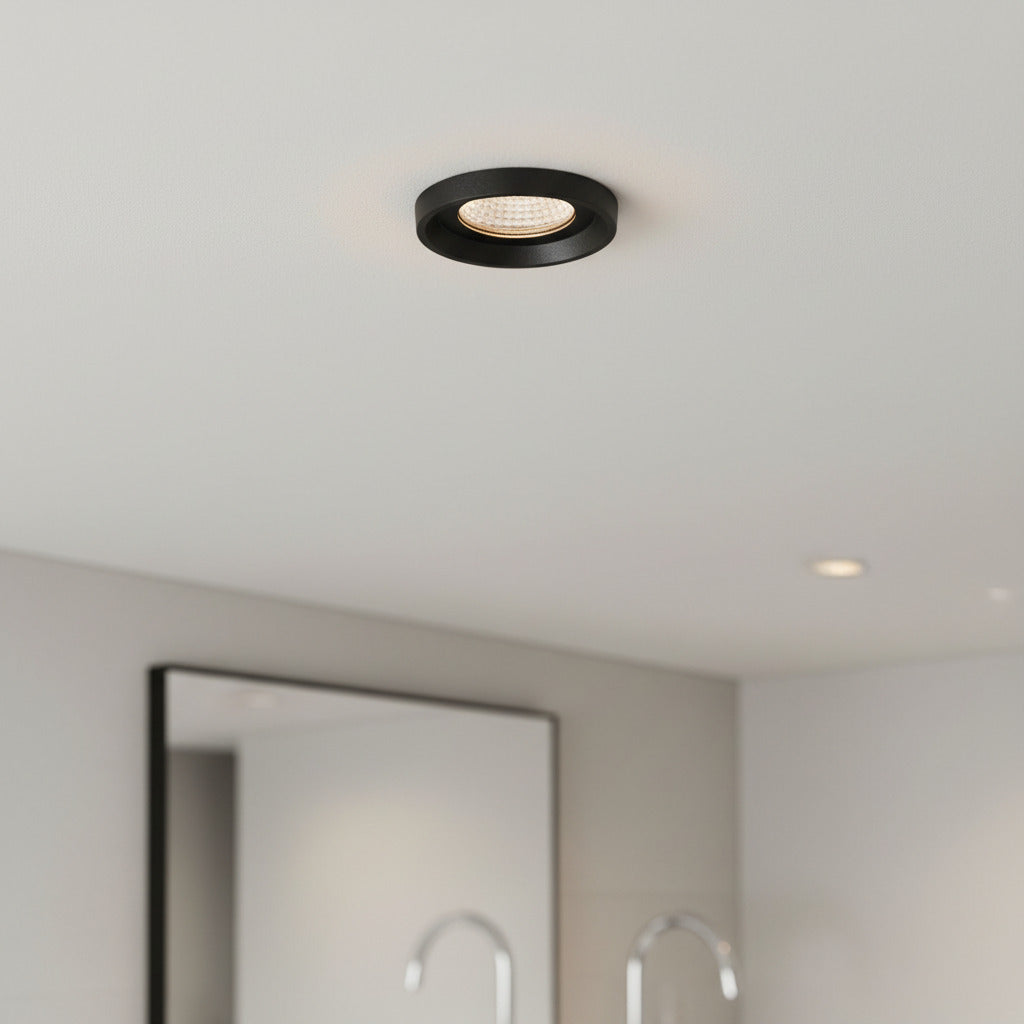 black bathroom ceiling spotlight recessed into a modern bathroom ceiling 