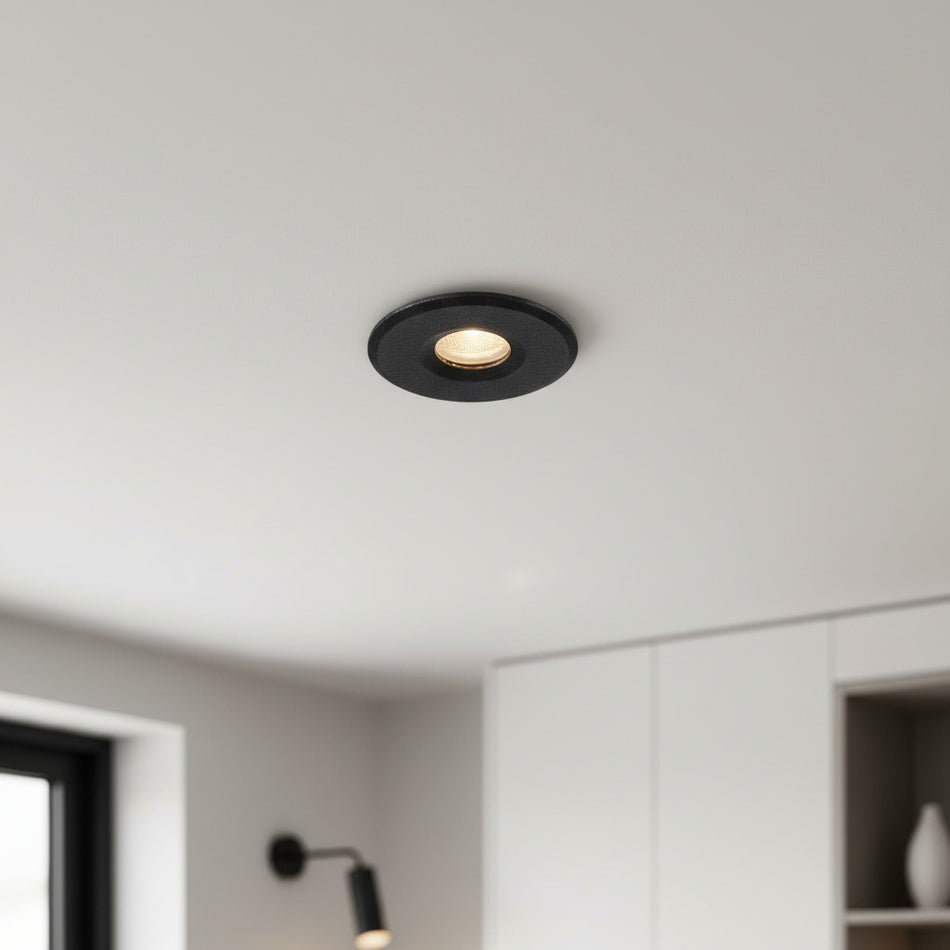 black mini recessed spotlight lamp installed in a modern home 