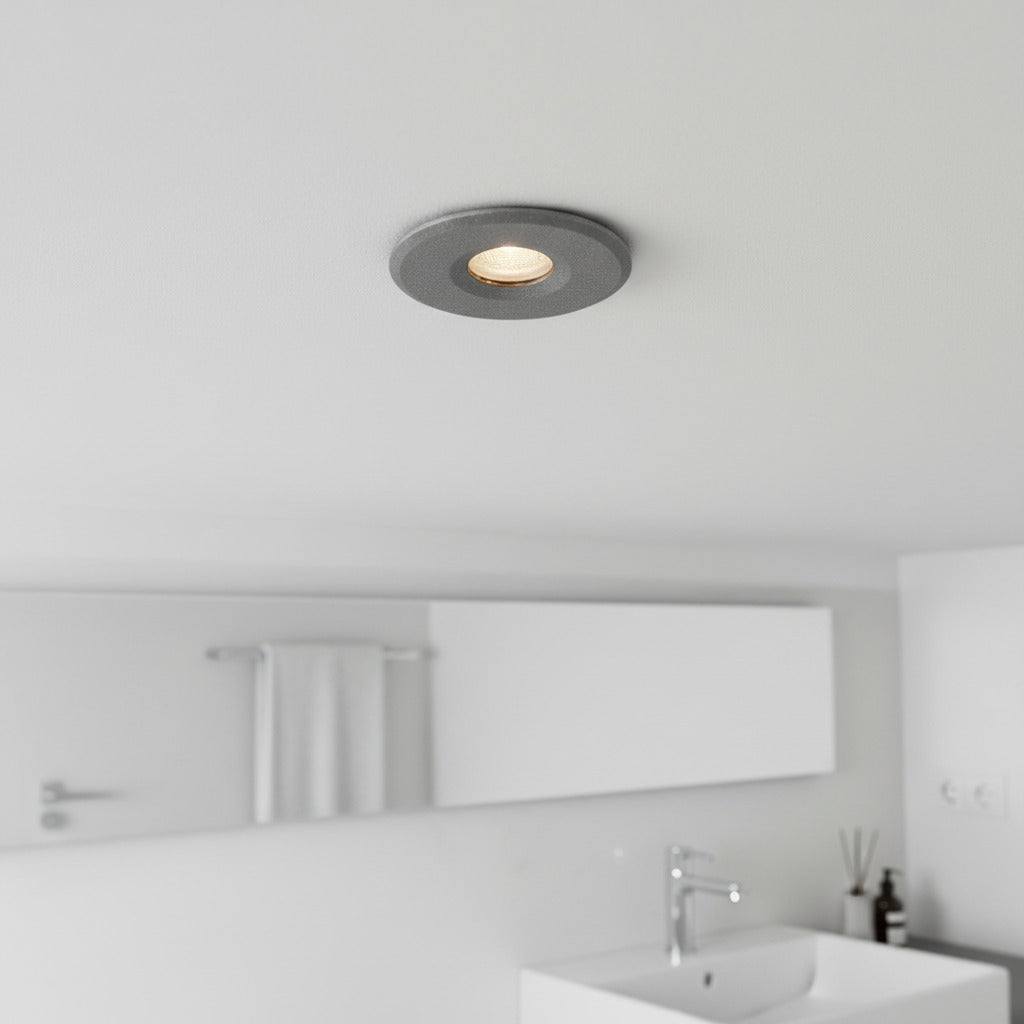 grey small recessed bathroom ceiling light installed on a modern bathroom ceiling