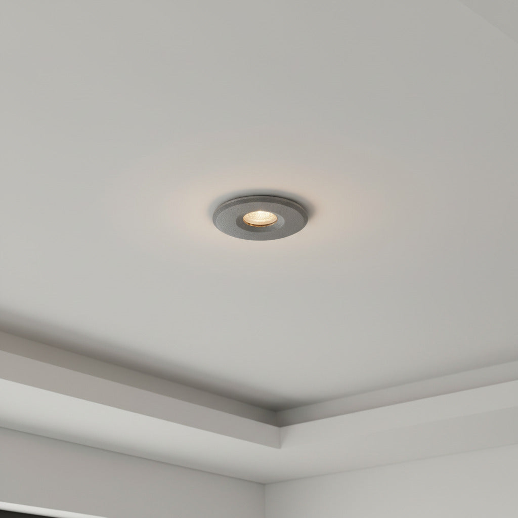 grey mini ceiling spotlight installed in a modern home