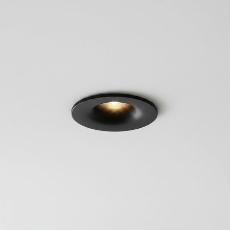 black LED ceiling recessed light mounted in a grey ceiling 