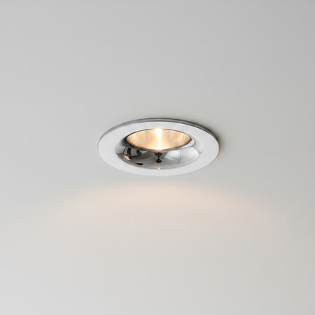 chrome LED recessed spot light installed in the ceiling of a home