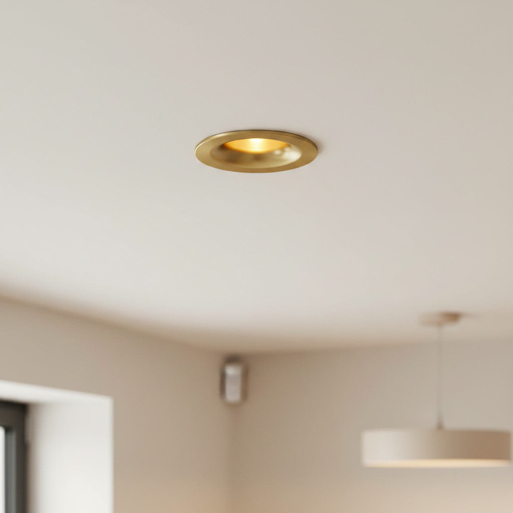 gold LED downlight spotlight installed in a modern home 