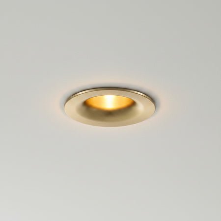 gold LED downlight spotlight installed on a grey ceiling